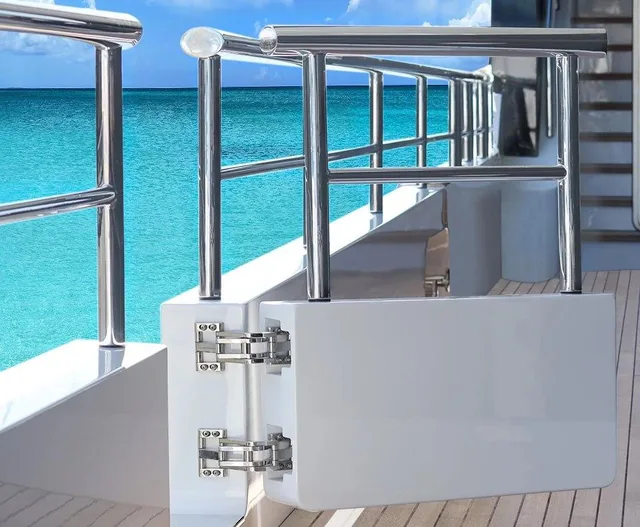 BULWARK access door installed flush in a yacht bulwark, stainless guardrail and deck beyond