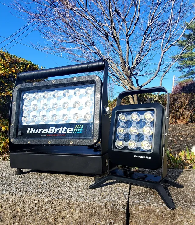 DuraBrite Explorer X16 and X7 portable lights standing outdoors